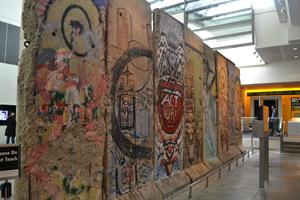The Newseum includes the largest display of the Berlin Wall of any museum. Each of the eight graffitied slabs are 12 feet high and weigh almost three tons. The guard tower, known as Checkpoint Charlie, is also on display. The tower is a symbol of the defeat of tyranny.