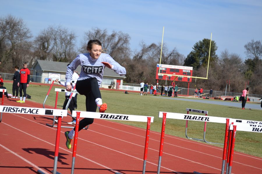 Track team defeats county rivals at conference meet