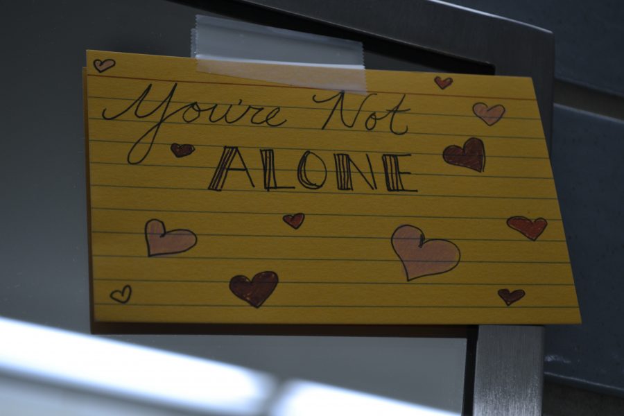 These positive notes are scattered across the bathroom mirrors, walls and stalls on the first, third and fourth floors. 
