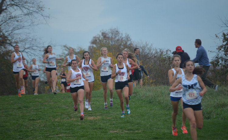 The girls compete at the Regional Race at John Handley High School.