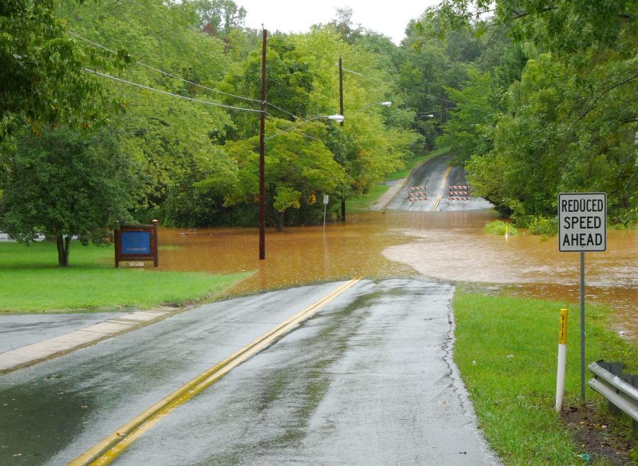 Authorities caution against driving on flooded roads.