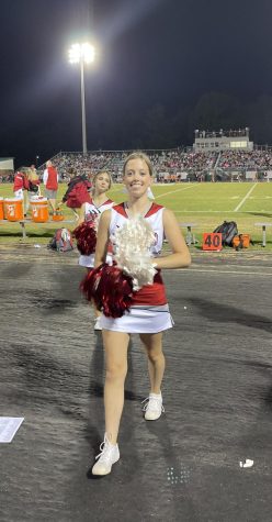 Izzy cheers for the Falcons during a football game this past fall season. 