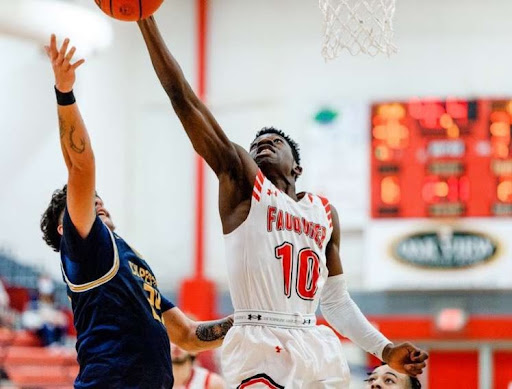 Senior Kevin Chienku rises for layup