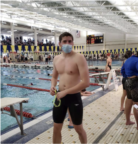 Mason Worst prepares for State Finals in his last high school swim meet.