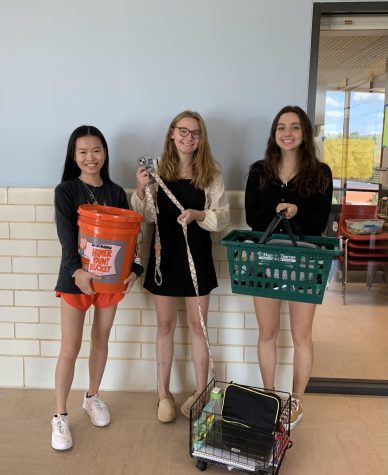 Lilly, Sophia Mesick and Zara Atcheson pose for ¨Anything but a backpack¨ day