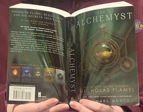 The Alchemyst: The Secrets of the Immortal Nicholas Flamel book cover from Delacorte Press. Art by Michael Wagner