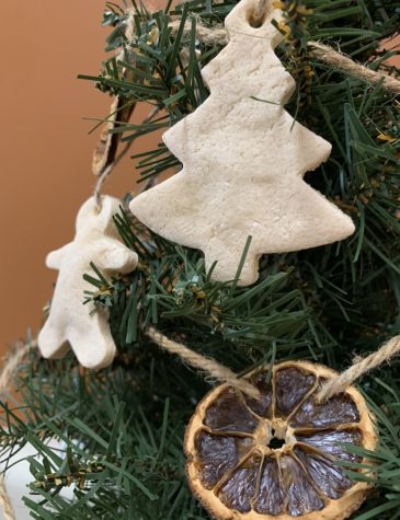 Salt dough ornaments and dried garland decorate this tree