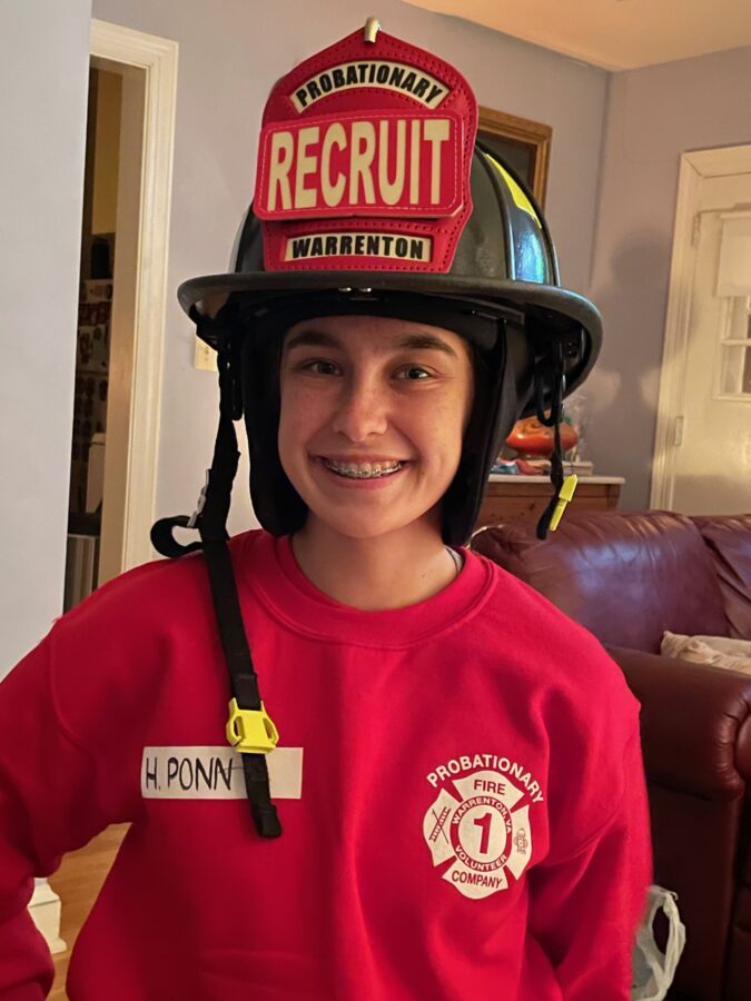 Ponn enjoys her first day as a volunteer firefighter.