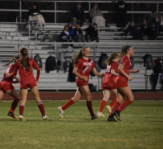 Lily Retana-Rodriguez plays against Millbrook High School