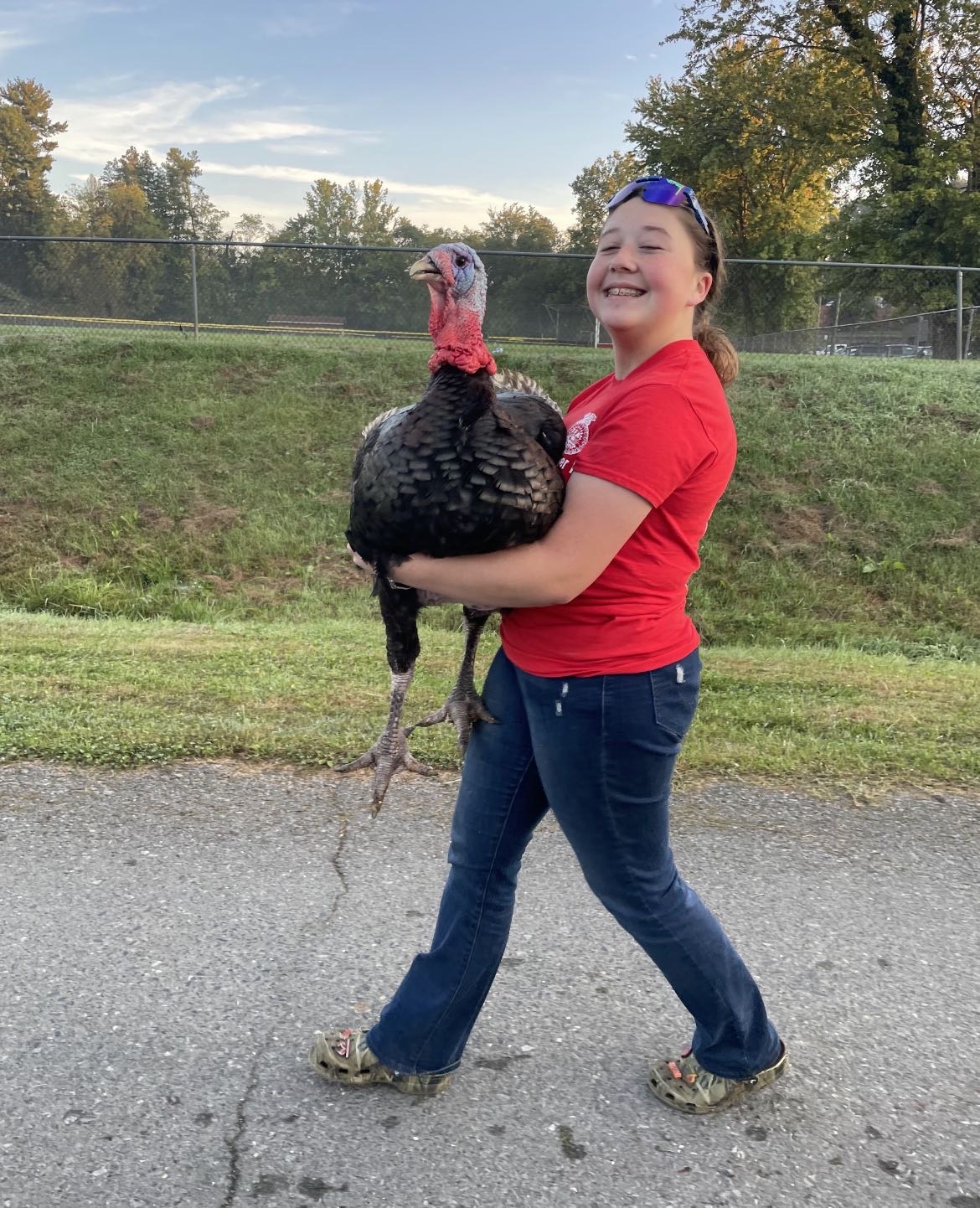 Alana Henegar helps out on the FHS school farm.