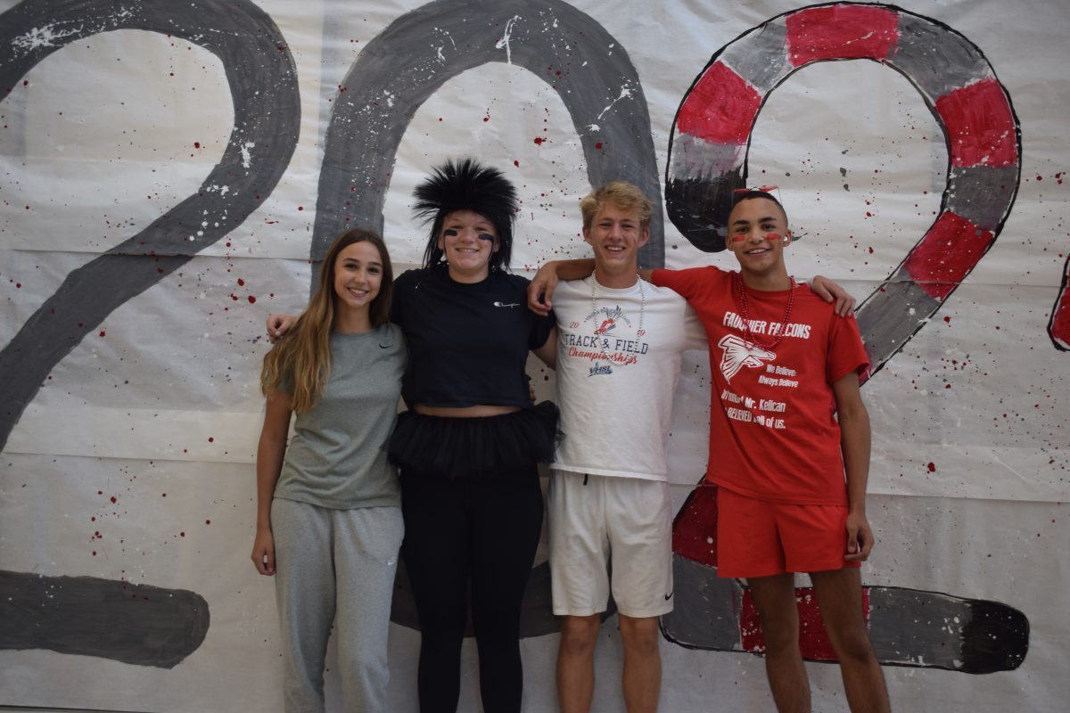 Freshman+Brooke+Maso%2C+sophomore+Kiersten+Clark%2C+junior+Sam+Pacassi%2C+and+senior+Riley+King+dress+up+for+class+color+Falcon+Friday+as+the+spirited+students+of+FHS.