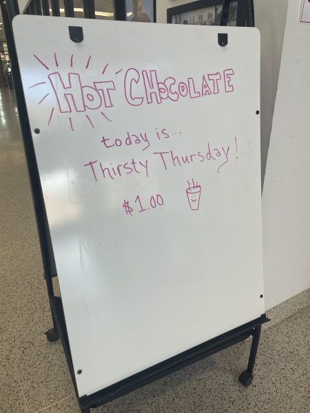 Thirsty Thursday sign beckons to students from outside of the library at Fauquier High School.