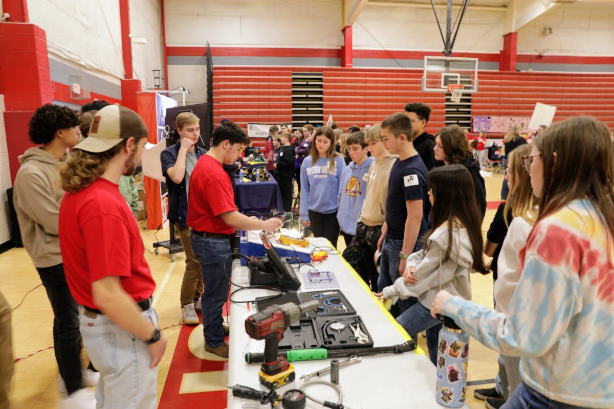 Middle school students learning about different electives at the Career and Technical Education Fair.