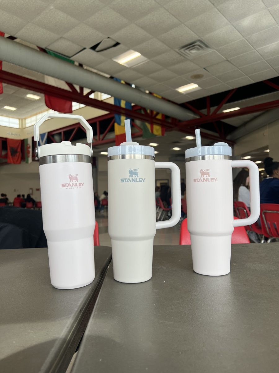 An array of pastel-colored Stanley Cups belonging to students in the lunch room.