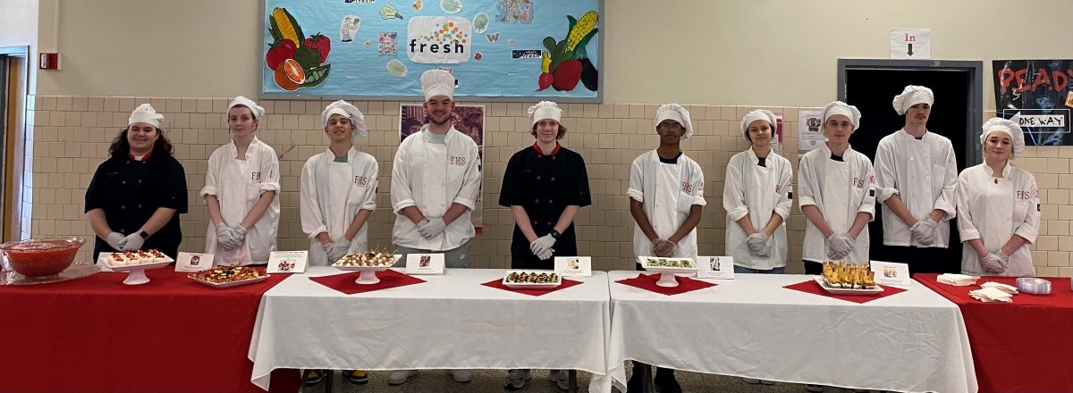 Culinary students are ready to serve food at The Best Teacher of the Year event. From left to right: Nicole Squitieri, Saoirse Tucker, Dawson Stidman, Ryan Toothman, Shane Hodsgon, Rashed (RJ) Moslay, Bailey Brock, Carlos Marin Barrera Jr., Mason Aliff, and Rori Ressler.