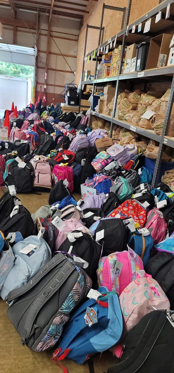 Backpacks+full+of+school+supplies+ready+to+be+sent+to+students.