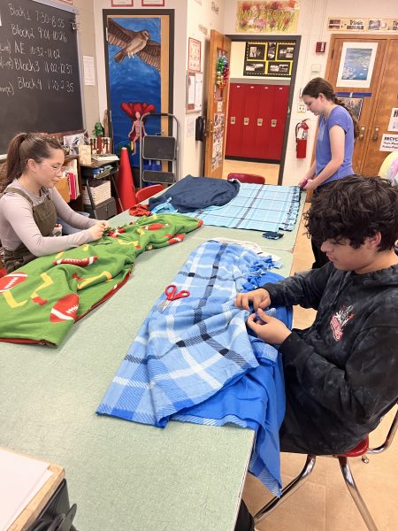 NAHS students make blankets for the fundraiser.