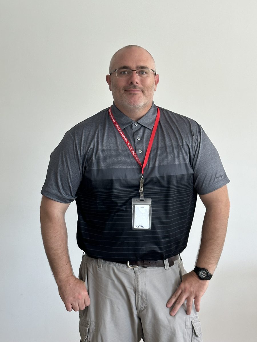 FHS fresh face, Aaron Carter, stands proudly in his classroom--ready to teach.