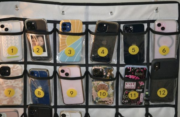 A classic phone caddy in which kids put their cell phones before each class.