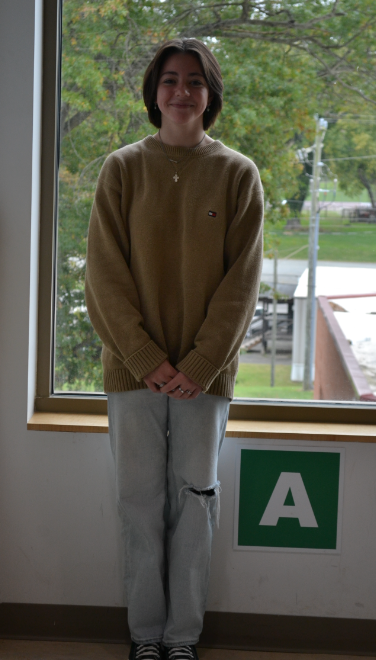 Sophomore Campbell Walker is ready for the chilly weather in a cozy sweater and jeans.