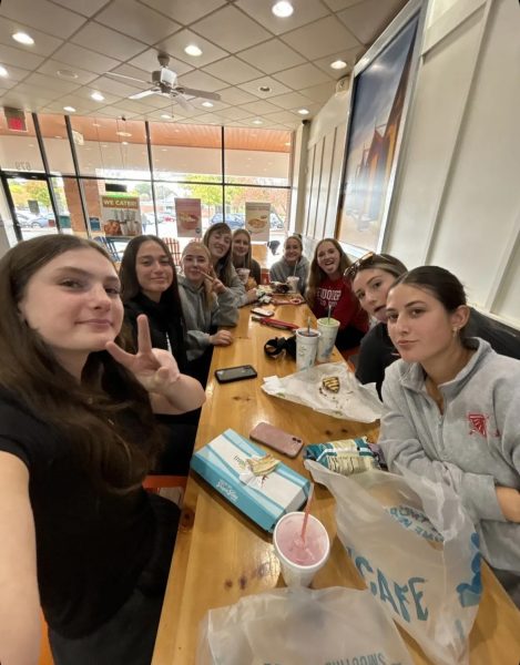 The Field Hockey team poses for a picture at Tropical Smoothie.