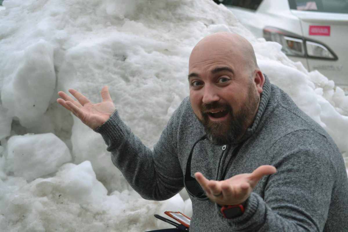 Principal Dr. Ferguson outside Fauquier High School as snow prompts schedule questions.