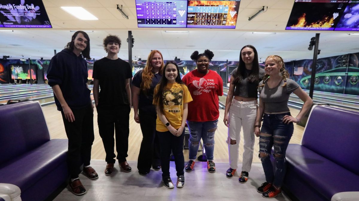 Mason Aliff (far left) poses with his fellow club members at Galaxy Strikes Bowling Center. 