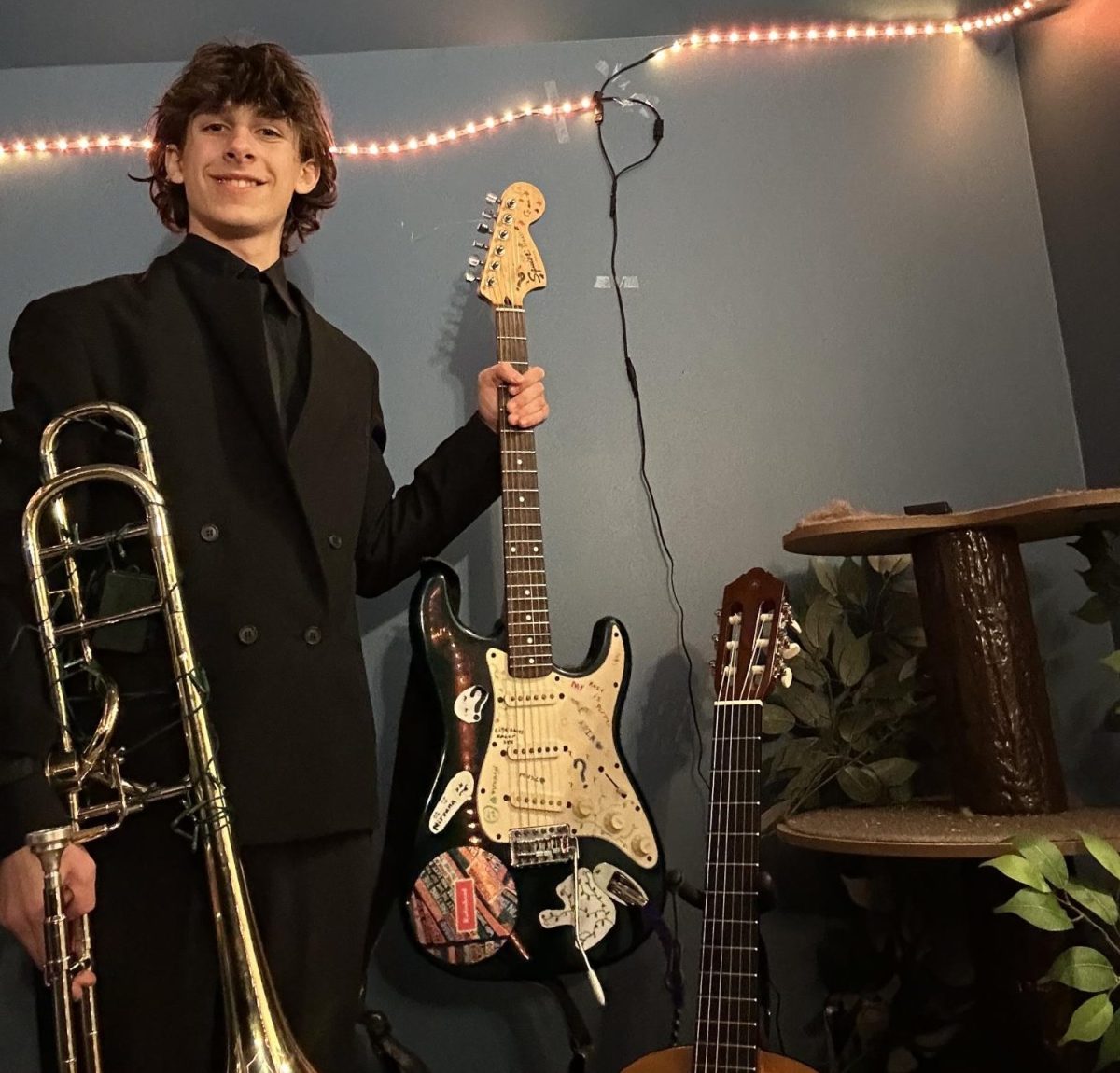 Dylan Rozsel poses with his instruments.