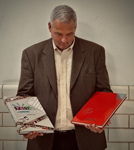 Ryan Reynolds gazes at his high school yearbook (right -1982-83) and his final yearbook (left - 2024-25).