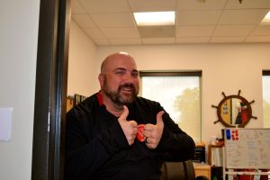 Principal David Ferguson showing his positivity with a bright smile.