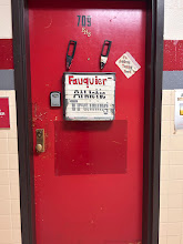 The athletic training room proudly displays a sign.