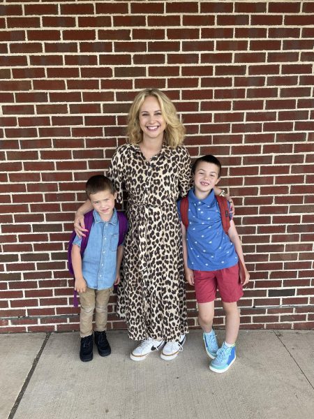 Krista Burkhart smiles with her two boys on the first day of school. 