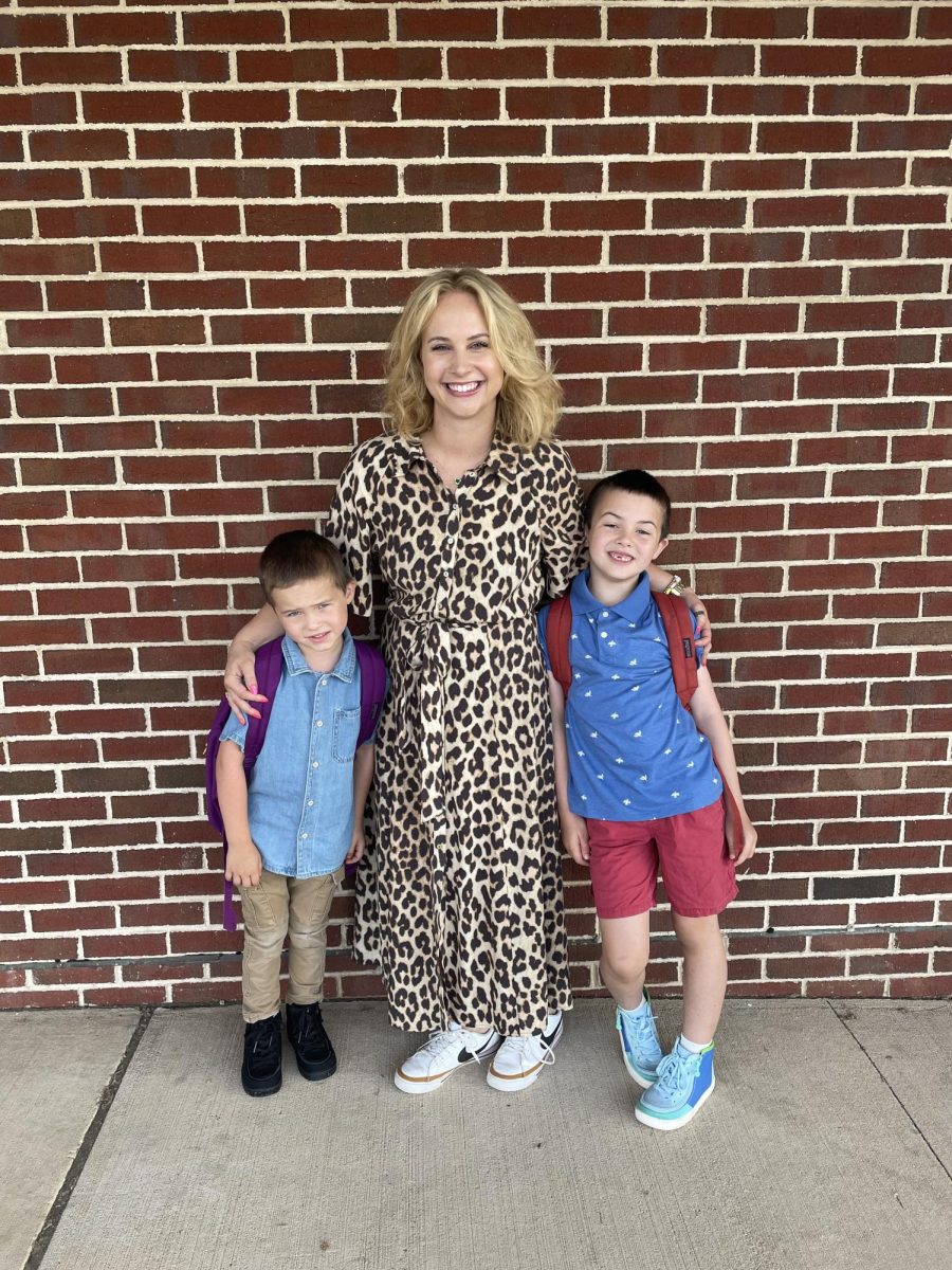 Krista Burkhart smiles with her two boys on the first day of school. 