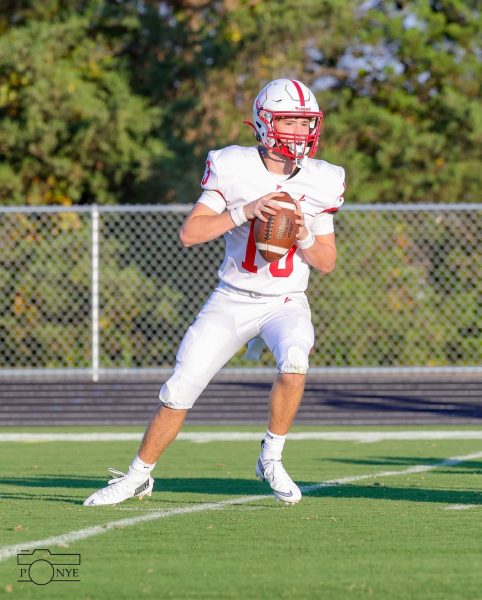 Cameron Kabinski weighs his options for a pass playing quarterback.