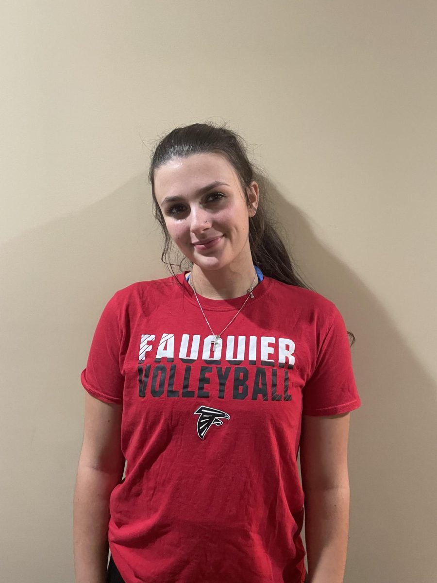 Volleyball Assistant Coach, Audrey Hall, is feeling accomplished after a long practice.