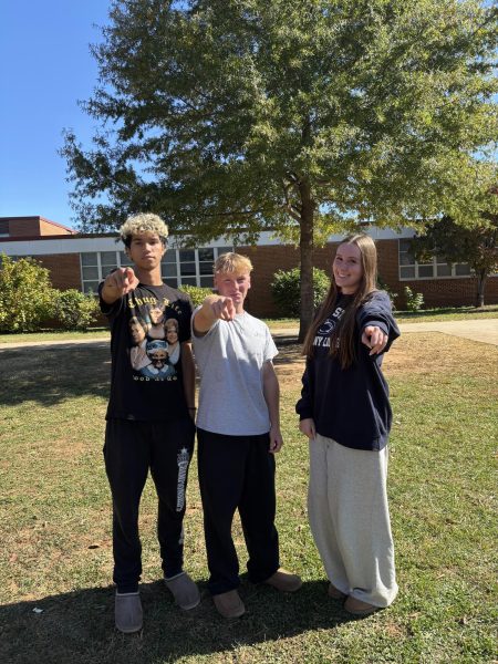 Zoo Captains (from left to right Joel Williams, Liam Pennel, Julia Bonnaire) are ready to cheer and get hype for the next game.