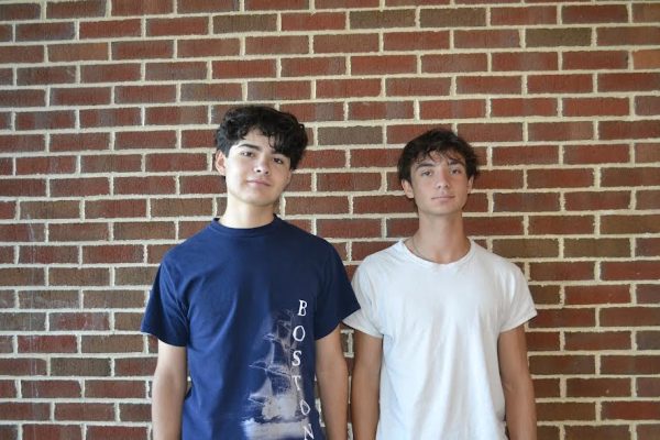 Founders of the Sports Analytics Club, juniors Said (Left) Lamas and Jonah Mossman (Right) pose up against the wall.
