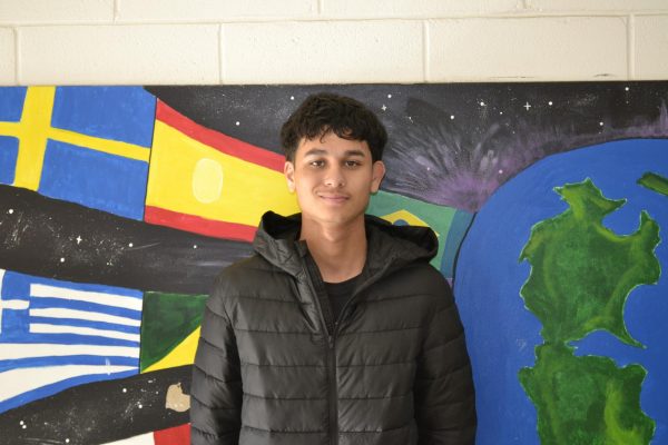 Senior Adomo Chavez smiling and excited to be a leader of the soccer team.