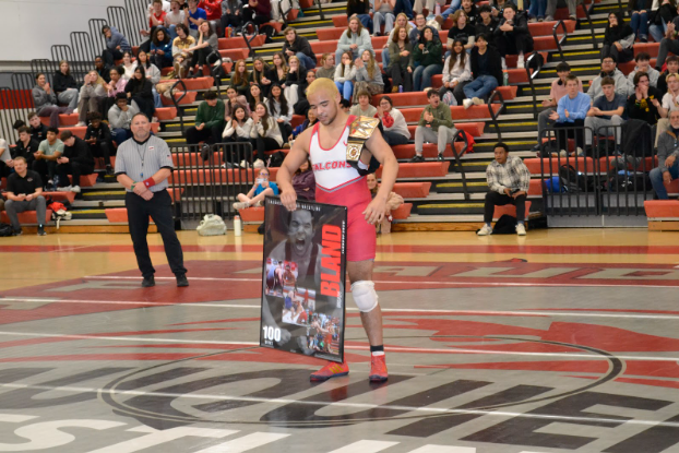 Brian Bland celebrating his hundredth win immediately after his match.