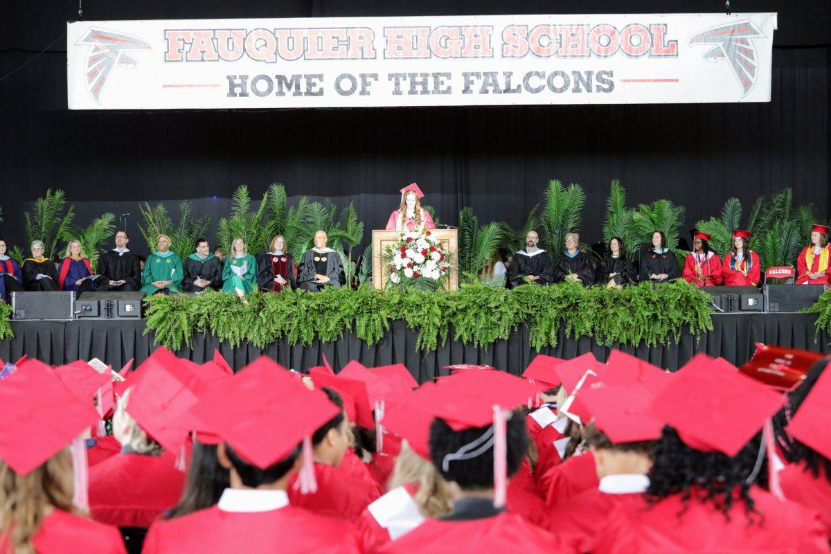 Graduates of class 2026 listening to the speech of the SCA president, Julia Bonnaire 
